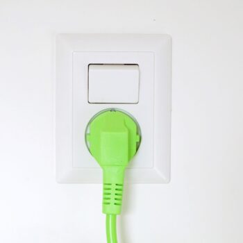 white-socket-with-green-plug-on-a-white-wall-2024-12-05-01-37-51-utc white-socket-with-green-plug-on-a-white-wall-2024-12-05-01-37-51-utc